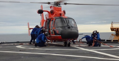 A Kodiak-based MH-65 trains aboard the USCGC
        
        in 2022.