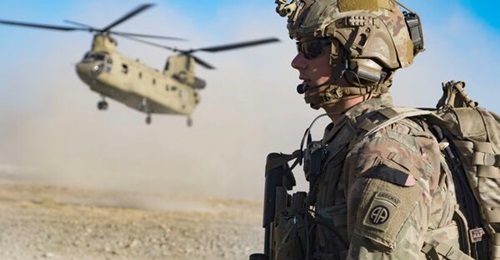 A US soldier attached to 3rd Brigade Combat Team, 82nd Airborne Division secures a helicopter landing zone in southeastern Afghanistan in 2019.