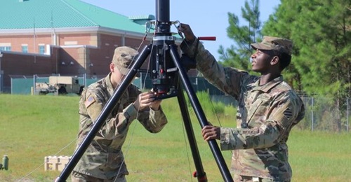 Multichannel transmission systems operator-maintainers from the 2nd Armored Brigade Combat Team, 3rd Infantry Division, assemble a Terrestrial Transmission Line Of Sight radio system at Fort Stewart in Georgia in August 2019.