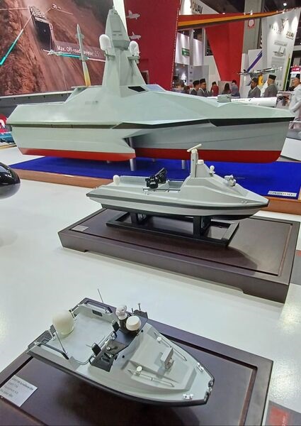 The 7.5 m Scout S45 surveillance USV and a 15 m Cavalry A150 attack USV are pictured on display at DSA 2024. The A2000 surveillance and attack USV is seen in the background.