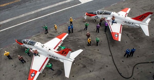 A T-45C Goshawk attached to Training Air Wing (TW) 2 receives fuel aboard the aircraft carrier, USS 
        
        (CVN 77). The ship is conducting sustainment exercises to maintain carrier readiness.