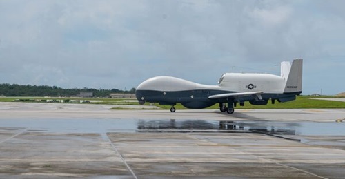An MQ-4C Triton UAV of the US Navy's Unmanned Patrol Squadron 19 taxis after landing at Andersen Air Force Base, Guam, on 4 August 2023.