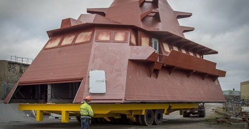 Saab Kockums builds the composite superstructure for Singapore's Independence-class littoral mission vessel. Above, the superstructure for the fifth ship in the class is being prepared for transport to Singapore.