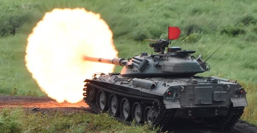 The Type 74 MBT (pictured above) - firing a round during an annual live-fire exercise in 2015 - is armed with a locally manufactured L7A3 105 mm rifled gun as its main armament that is fitted with a fume extractor at the rear.