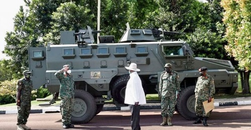 Ugandan President Yoweri Museveni inspects a Chui armoured vehicle.