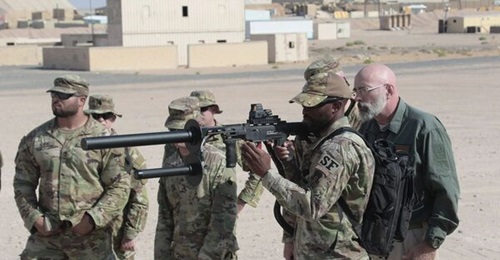 A member of the US Air Force's 386th Expeditionary Security Forces Squadron trains with a DroneDefender system during the C-UAS training at Camp Buehring.