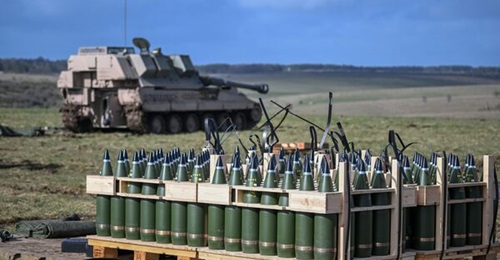 The UK's latest military aid package to Ukraine includes 10 AS90 SPHs and 32 barrels allowing the guns to fire another 60,000 155 mm rounds (pictured during training of Ukrainian crews in southwestern England on 24 March 2023).
