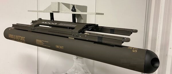 The Arnold Defense 'Trident' three-round launcher prototype concept demonstrator mounted on Moog Space and Defense Group's Lightweight Dual Rail Launcher.