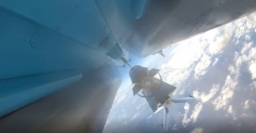 A screenshot of a Russian MoD video showing the moment of release of the FAB-3000 glide bomb from the centreline hardpoint of an Su-34 strike aircraft over Ukraine.