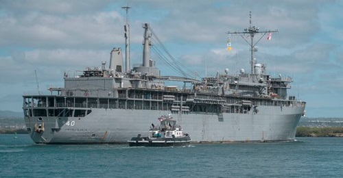 The US Navy is looking to replace its submarine tenders like USS
        
         (pictured here), which was commissioned in 1979.