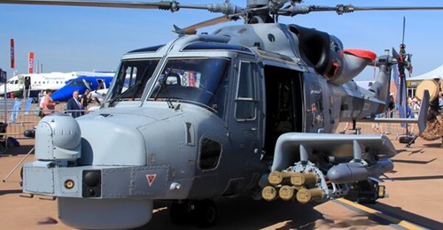 Seen at the Royal International Air Tattoo earlier in July, a Royal Navy Wildcat helicopter carries 10 Martlet and two Sea Venom missiles on its weapons wings.