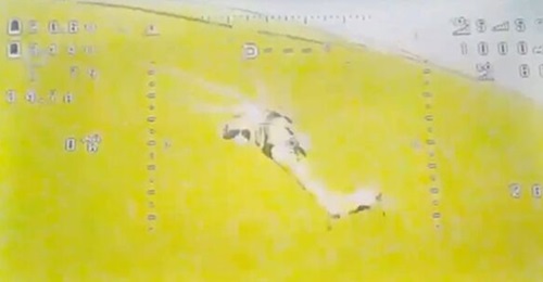 A screenshot from a Ukrainian FPV drone, moments before it impacts the tail rotor of a Russian Mil Mi-28 'Havoc' attack helicopter. This event marked the first ever successful targeting of a manned aircraft in flight by a UAV to be documented.