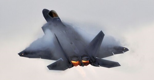 A file photo of an F-22 Raptor combat aircraft. The USAF is sending 12 of its premier air-to-air fighters to the Middle East as part of a wider build up to counter any Iranian threat to Israel.