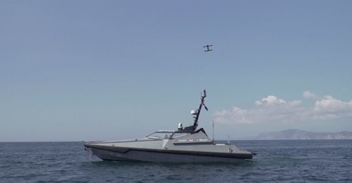 An AeroVironment Switchblade 300 tactical precision-guided missile is fired from the UK's MADFOX USV during the NATO 'REP(MUS) 21' exercise.