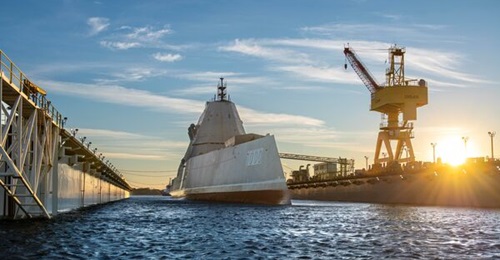 USS 
        
        , shown here undocking, recently completed modernisation for hypersonic missile capability.
