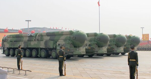 Several road-mobile DF-41 ICBM systems on display during a military parade held at Tiananmen Square in Beijing on 1 October 2019. According to the Pentagon's '2021 China Military Report', Beijing is rapidly increasing its nuclear arsenal and also consi...