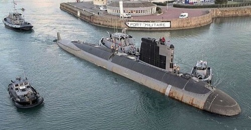 FS 
        
         departs Naval Group's shipyard assisted by tugs to be loaded on board the heavy-lift vessel MV 
        
        and transported to Toulon.