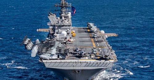 The US Navy FY 2026 budget request includes funding for America-class amphibious assault ship, like USS America, shown here.