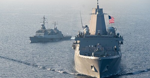 The US Navy's landing platform dock ship USS 
        
        and the Israeli corvette INS 
        
        carry out a passing exercise in the Red Sea on 15 November.