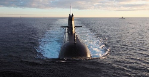 Royal Australian Navy Collins-class submarines HMAS 
        
        and HMAS 
        
        . Australia is planning to replace the class with a fleet of nuclear-powered boats.