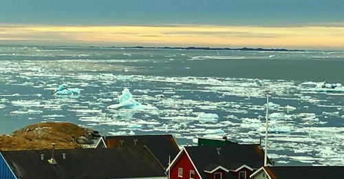 Denmark is investing in Arctic-capable ships to navigate through the ice-filled waters off the Greenland coast, pictured here.
