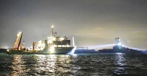 The Republic of Singapore Navy's first-of-class Littoral Mission Vessel, RSS 
        
         (right), keeping an eye on Malaysian Marine Department ship MV 
        
        , off Tuas.