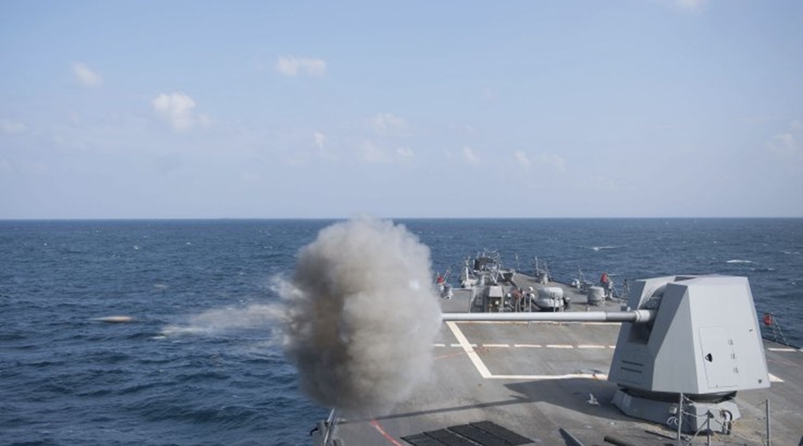 The USN Arleigh-Burke class guided-missile destroyer USS 
        
         (DDG 109) fires its MK 45 5-inch gun during a gunnery exercise in the Gulf of Aden in 2018.