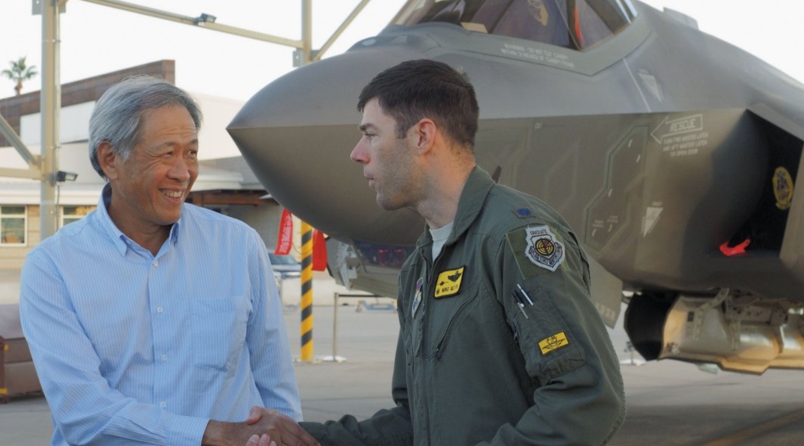 Singapore's defence minister Ng Eng Hen receives a briefing on the CTOL F-35A at Luke Air Force Base, Arizona, in December 2015. The country has announced that it will seek an initial purchase of four F-35 JSFs of an undisclosed variant for further eva...