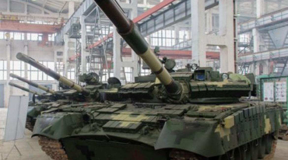 An upgraded Ukrainian T-80BV, recognisable from the lack of infrared sight to the left of the gun. UkrOboronProm claims that the ERA on this MBT provides protection from the latest anti-tank weapons, but no details have been provided as to how this is ...