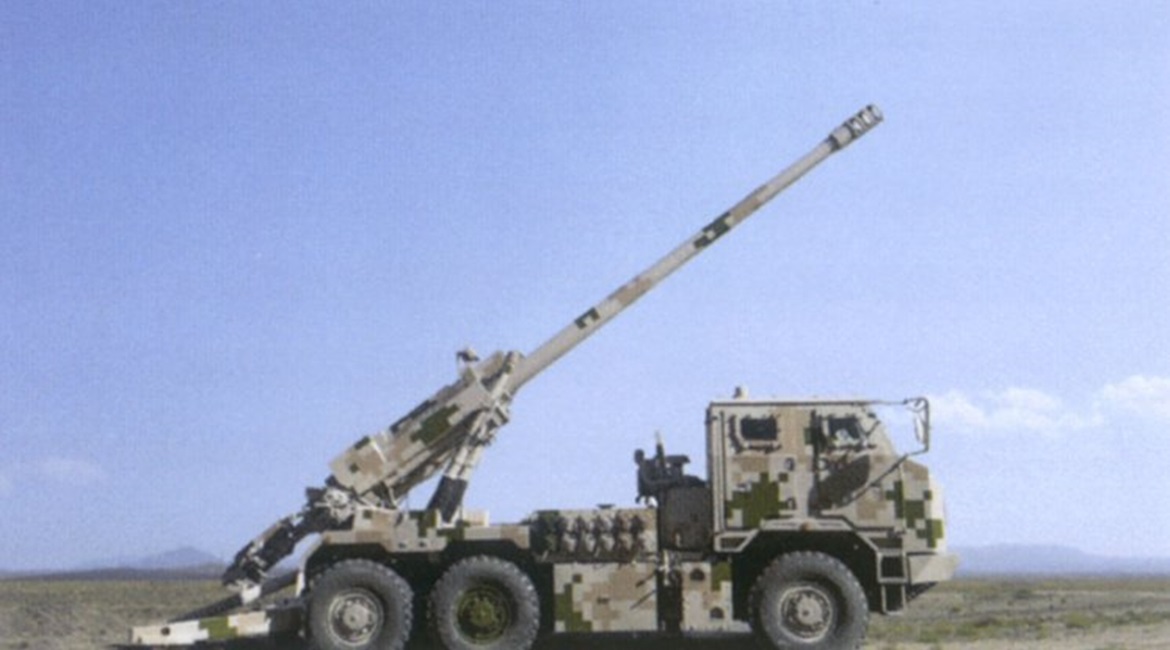 The SH-15 in the firing position, showing some of the 155 mm ammunition stowage on the cab rear.