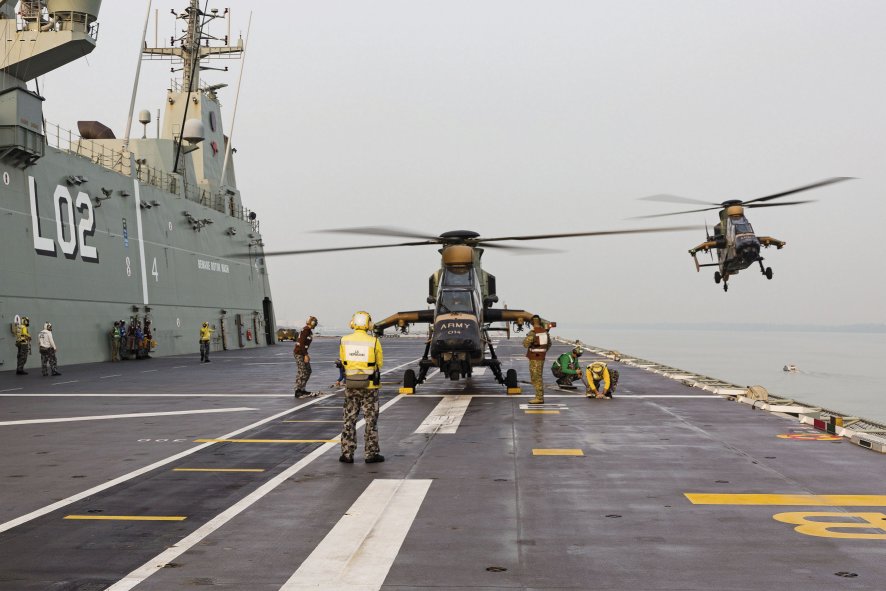 An Australian Army Armed Reconnaissance Helicopter lands on HMAS Canberra's flight deck during Indo-Pacific Endeavour 2019 (Commonwealth of Australia, Department of Defence)