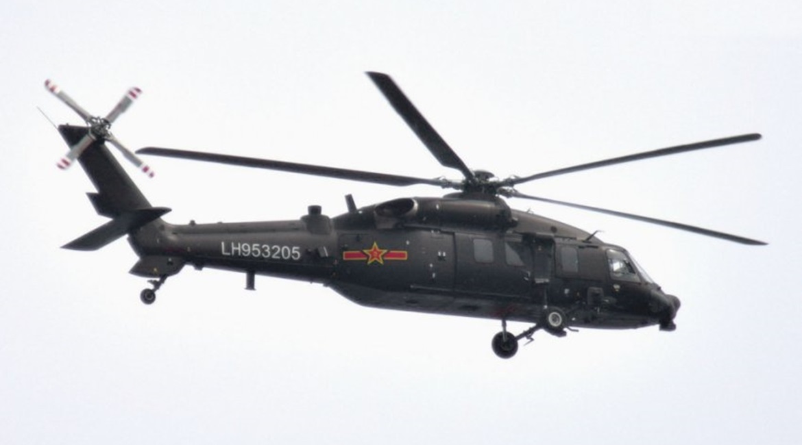 A Chinese Z-20 helicopter bearing the number LH953205: a serial number format indicating that this rotorcraft type has likely entered service with the PLA Army Aviation.