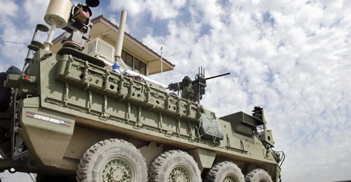 A Stryker with the 5 kW laser, mounted on the vehicle's rear. The US Army has decided to accelerate development of its MMHEL effort that seeks to integrate a 50 kW class laser on the vehicle.