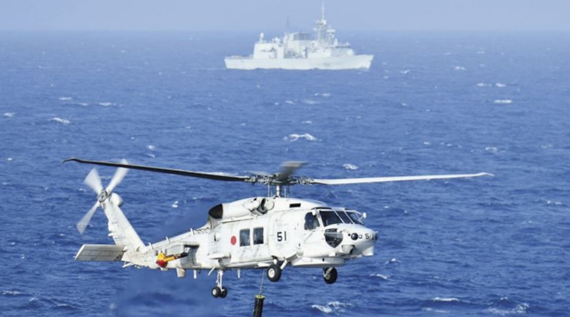 The JMSDF conducting interoperability  exercises with the RCN in the South China Sea in June.