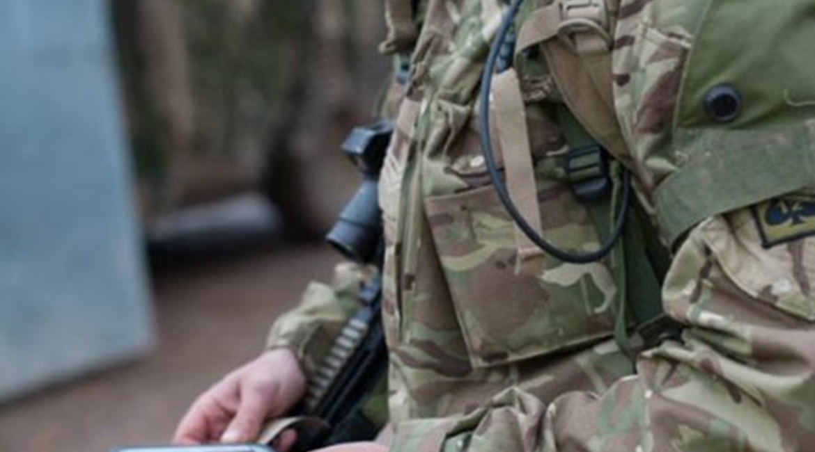 A Scots Guards sergeant with an infantry terminal introduced as part of the infrastructure element of BCIP 5.6.