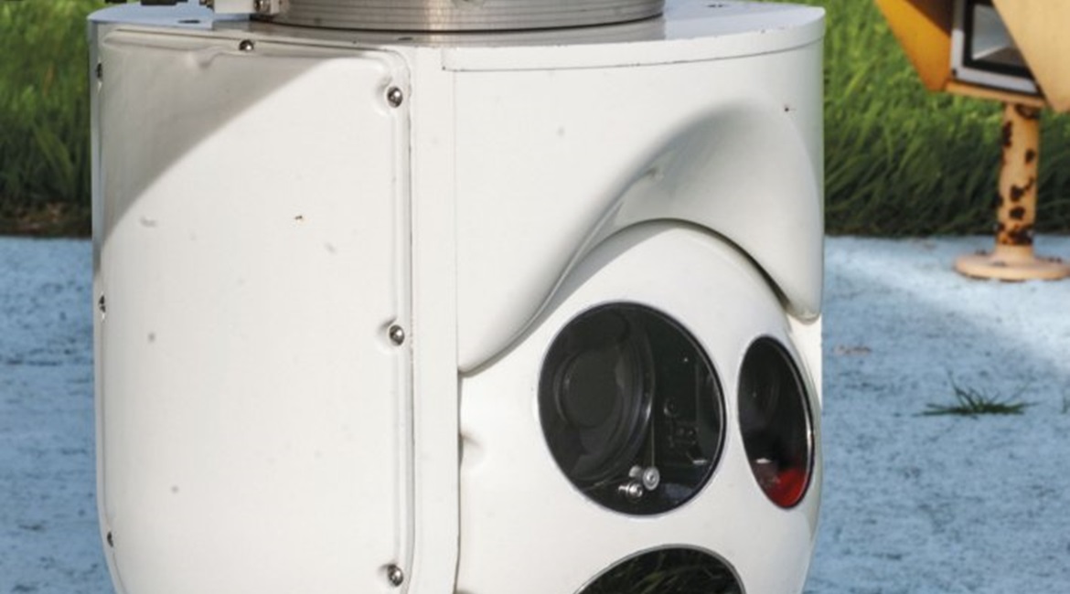 The standard FV300 gyrostabilised turret seen on a commercial Bell 407 helicopter. The turret has been selected to form the basis of a new sensor pod for the FAA's in-development Vigía 2B UAV.