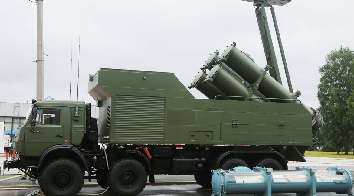 The Typhoon JSC Research and Production Enterprise Rubezh-ME mobile anti-ship missile system is shown here with a canistered Kh-35UE round in the foreground.