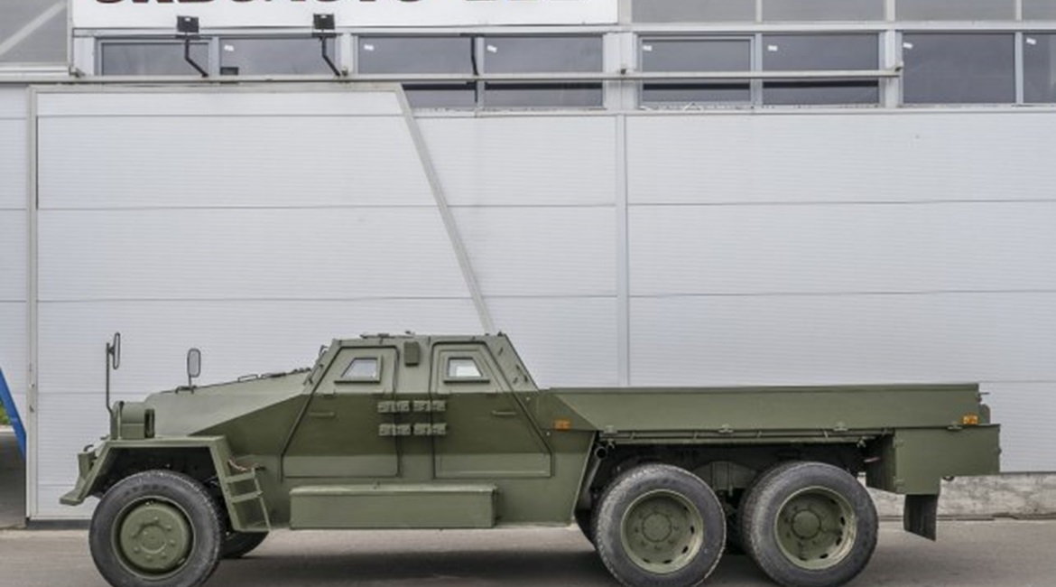 The upgraded Praga VS35, showing the new four-door protected cab. The flatbed's sides fold down to fit the twin 30 mm weapons.