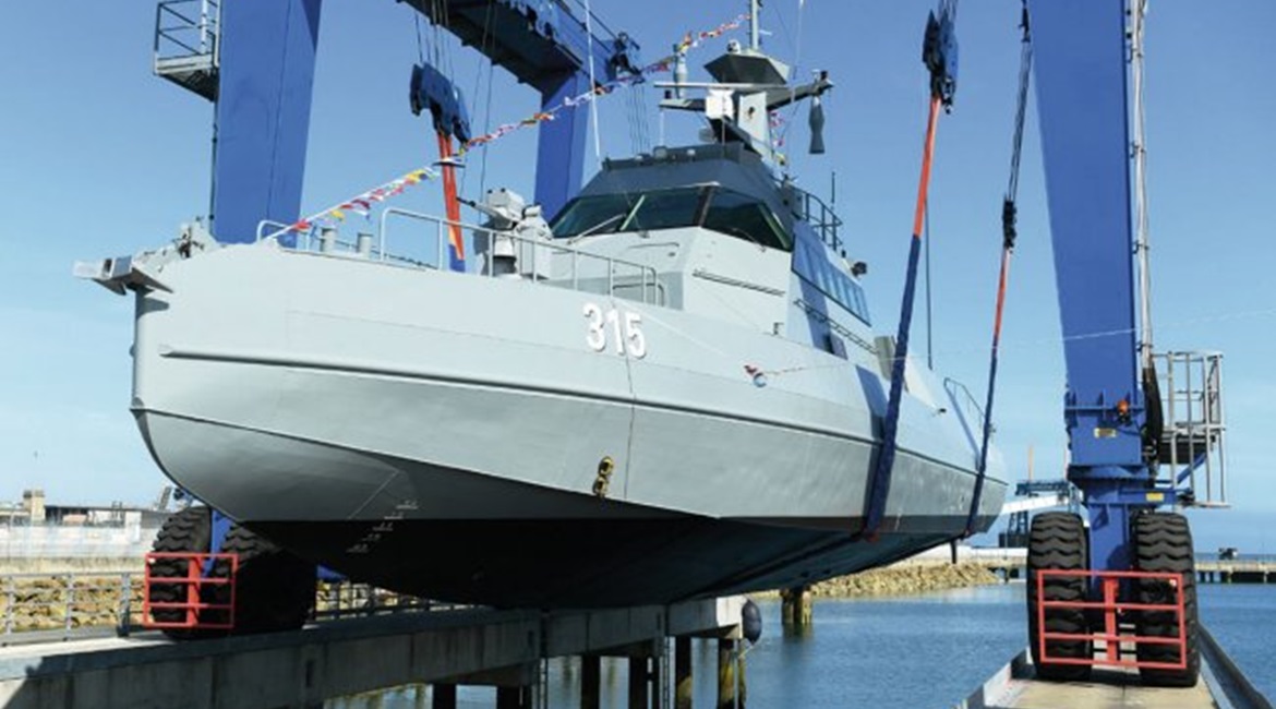 A Saudi HSI32 fast patrol boat is seen in a shiplift at Cherbourg.