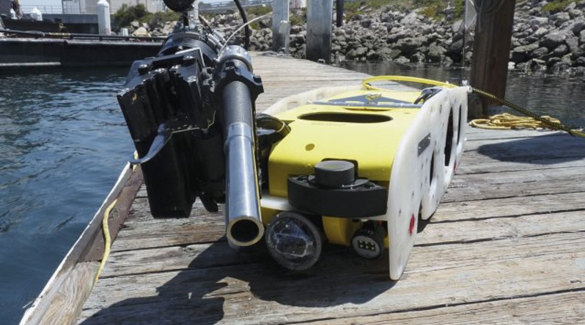 Saab's Sea Wasp ROV is seen fitted with the Carbon Fire disruptor on its manipulator arm during Exercise 'Coastal Trident' in 2016. The vehicle's manipulator arm can carry lethal and non-lethal effectors.