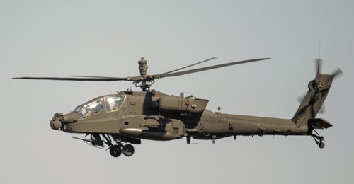 The US Army will host a demonstration in August where it will fire Rafael Spike Non-Line-of-Sight missiles from a Boeing AH-64E Apache aircraft. A Version 6 helicopter is seen here conducting operational trials at Fort Hood.