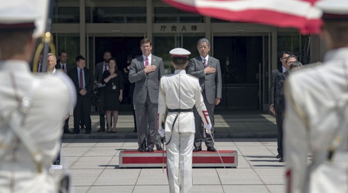 US Defense Secretary Mark Esper stands with Japanese Defense Minister Takeshi Iwaya in Tokyo on 7 August.