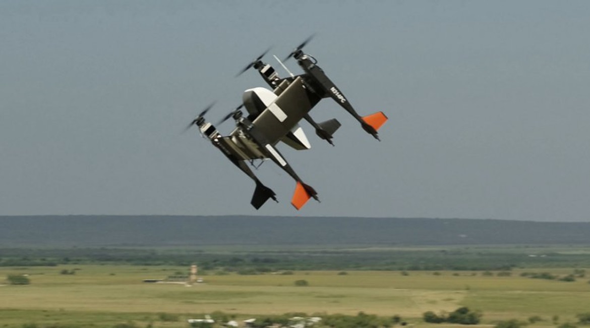 The Bell Autonomous Pod Transport (APT) 70 scalable modular unmanned vertical take-off and landing (VTOL) aircraft (left) from a flight in August 2019.