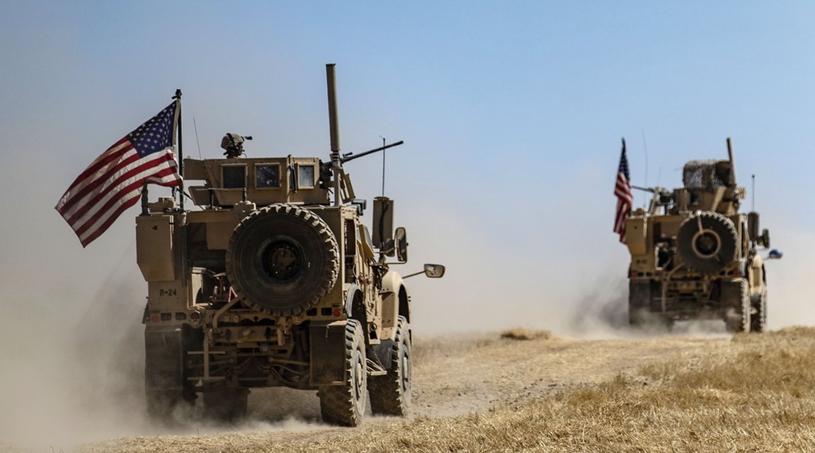 A US military convoy participates in joint patrol with Turkish troops in the Syrian village of al-Hashisha on the outskirts of Tal Abyad town along the border with Turkish troops on 8 September. The US and Turkey have begun joint patrols in northeaster...