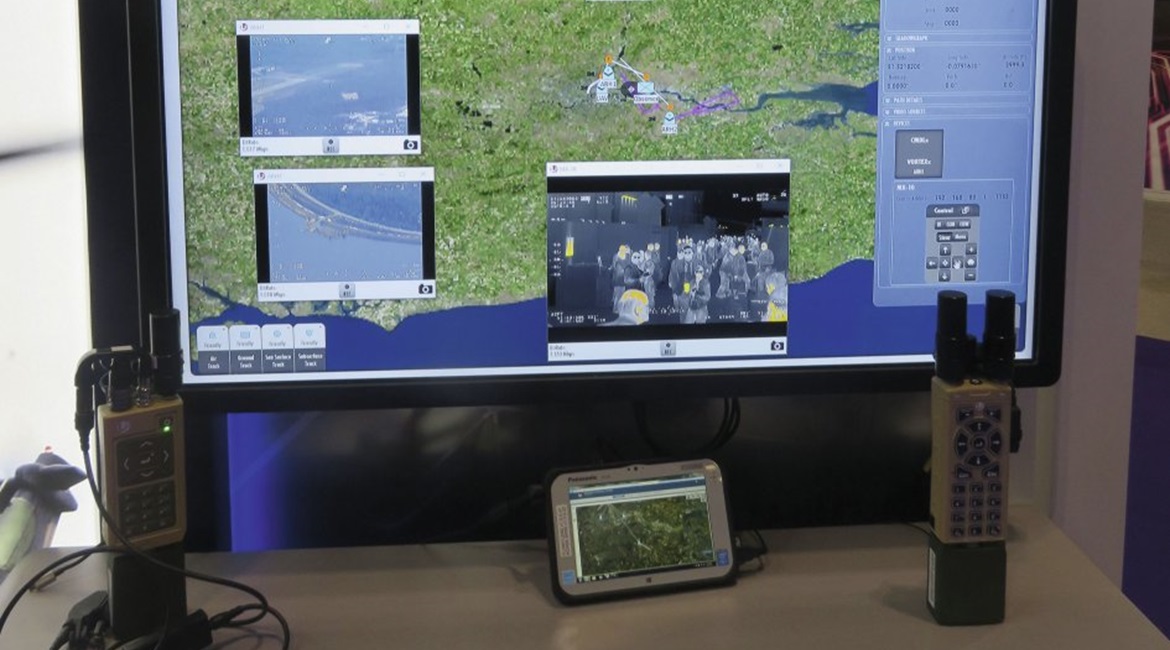 The L3Harris Technologies network control system for manned/unmanned teaming demonstrated at DSEI 2019. The images on the left of the situational awareness map are sensors from two attack helicopters, the image in the middle is from an L3 Wescam MX-10 ...