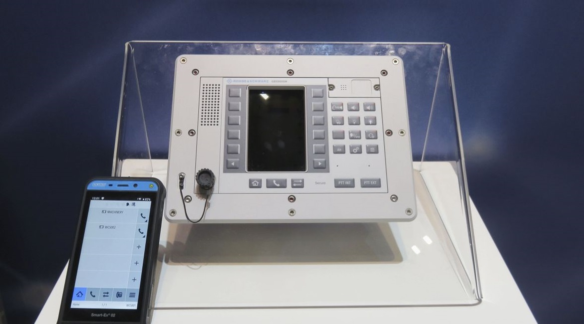 A Rohde & Schwarz NAVICS fixed terminal and a mobile voice terminal displayed at DSEI 2019.