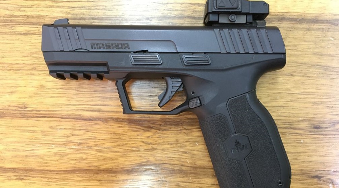 IWI's 9 mm Masada pistol, shown with a Meprolight red-dot sight.