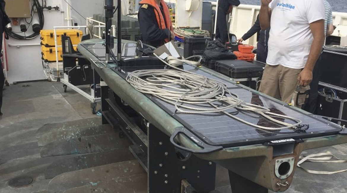 A Waverider USV is prepared for launch on NATO's Exercise REP(MUS) off Portugal in September 2019. The exercise saw a range of surface and submarine platforms networked together using the Janus communications standards.