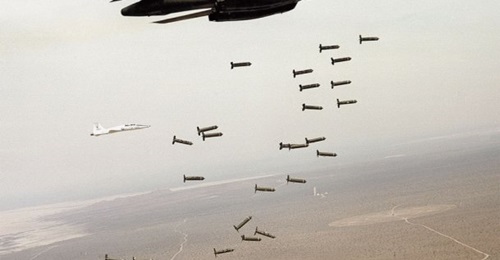 A B-1B bomber dropping cluster munitions during tests. The USAF is replacing this class of weapon, which spreads live bomblets across a large area, with a family of next-generation bombs that use fragmentation to achieve the same effect.
