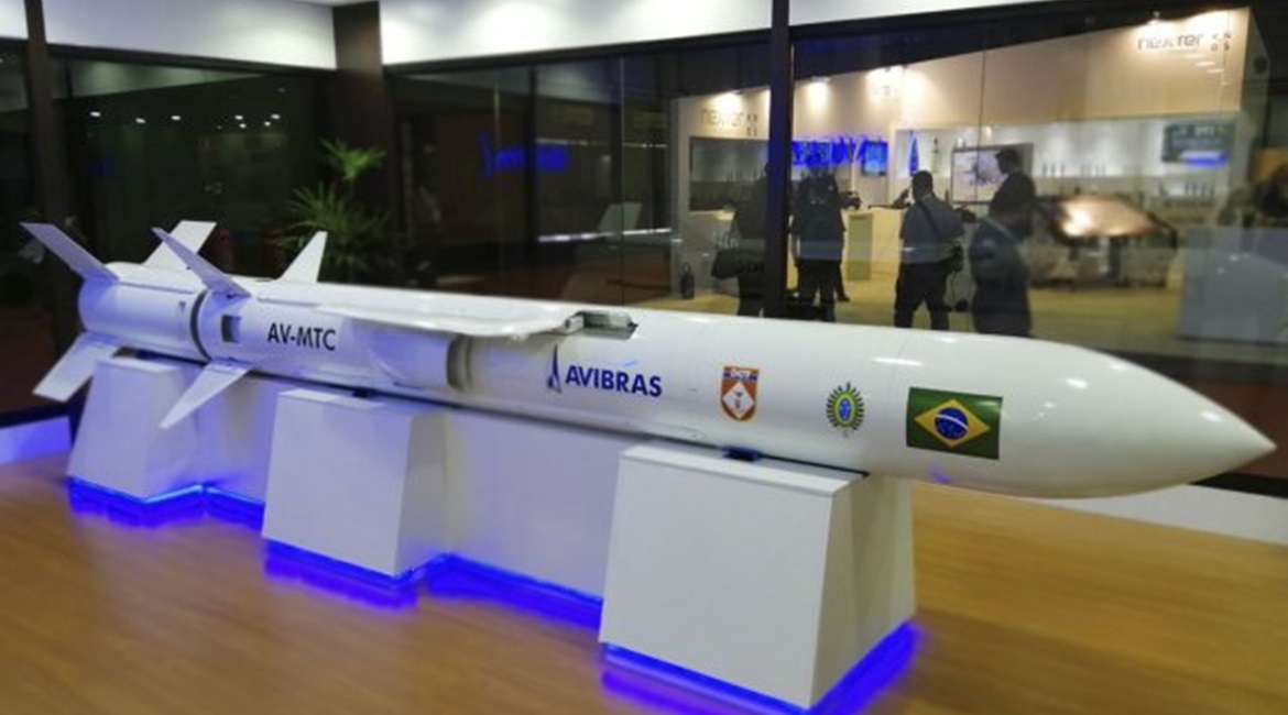 The Avibras AV-MTC/MTC-300. The original mid-body fixed-wing assembly has been replaced with fold-out wings.